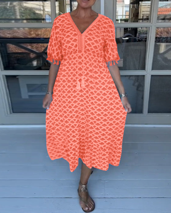 V-ringad ledig klänning med tryck