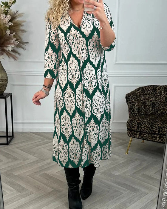 Lapelklänning med tryck i sidled