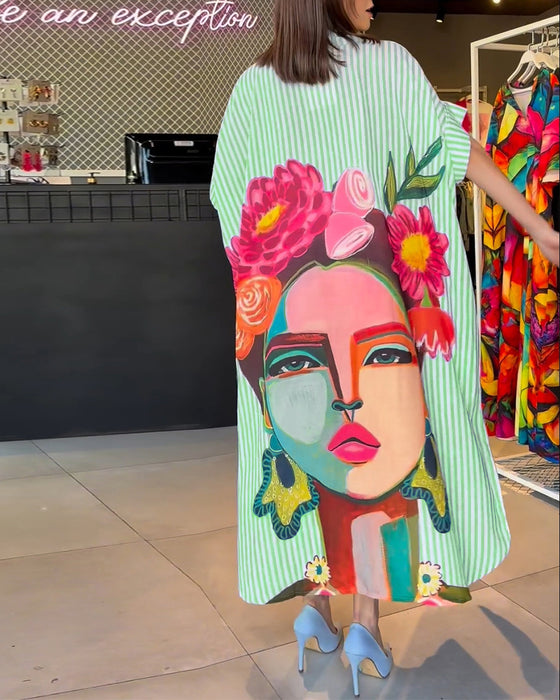 Vertikal randig blus med karaktärstryck i lapel