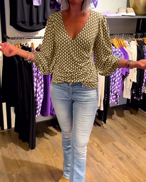 Långärmad topp med djup V-ringning