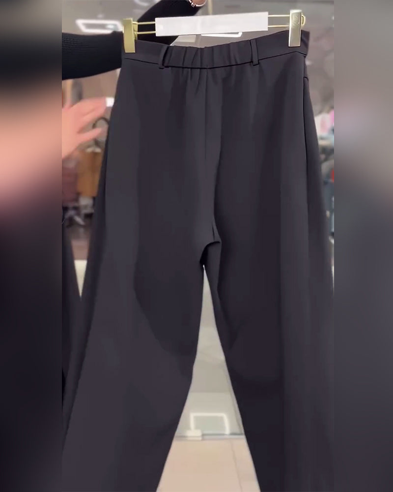 Avslappnade Asymmetriska Byxor Med Lager Och Vida Ben