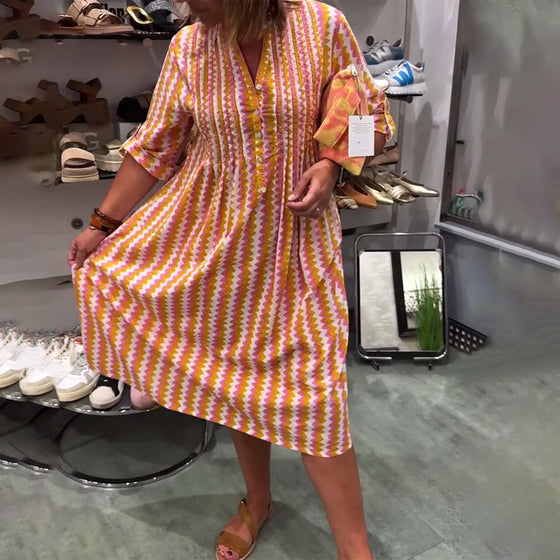 Klänning med vågmönster