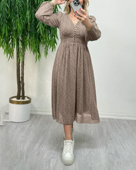 Elegant klänning med tryck