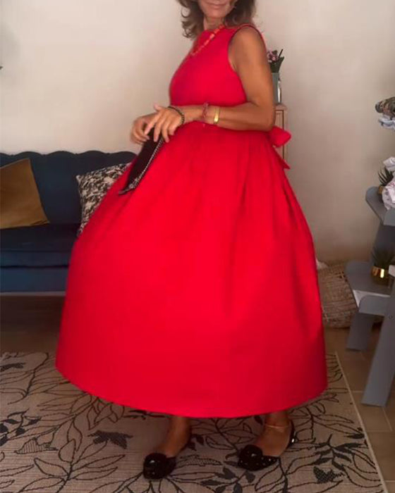 Rygglös Klänning Med Bow