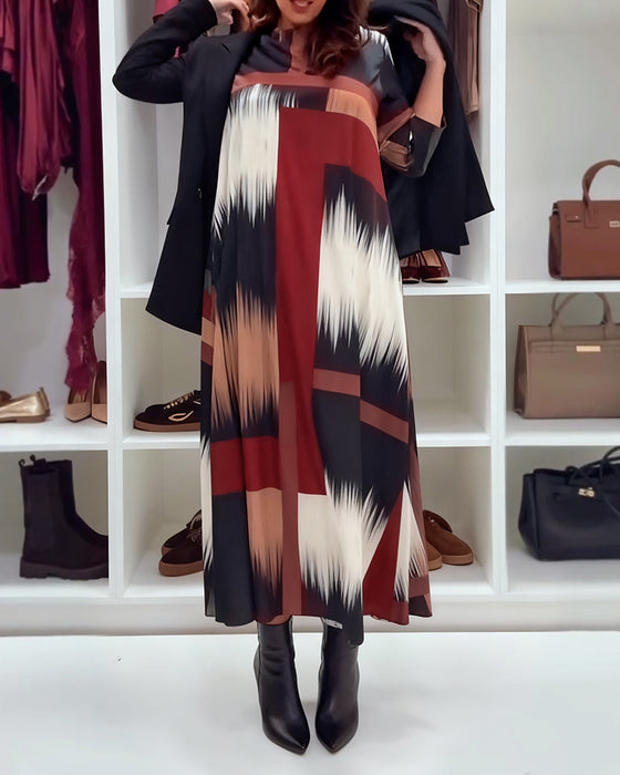 Modig Tryckt Klänning Med Runt Halsutsnitt Och Långa Ärmar