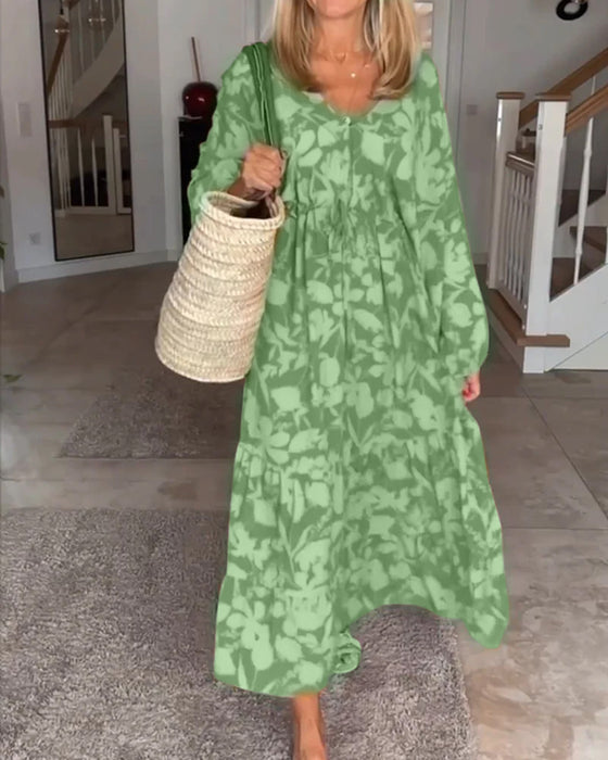 Blommig långärmad klänning