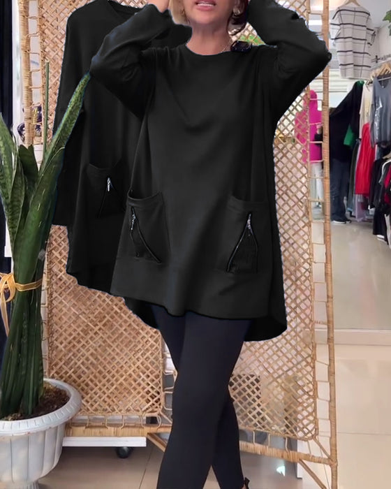 Enfärgad dragkedja i enfärgad tröja med rund hals