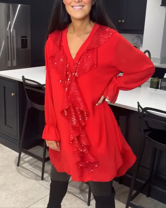 Blus med volanger och elegant stil