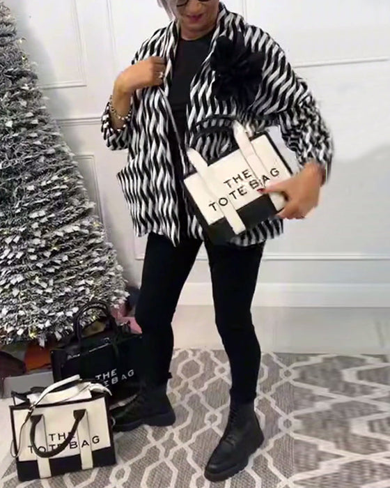 Modeväska med tvåfärgssömmar