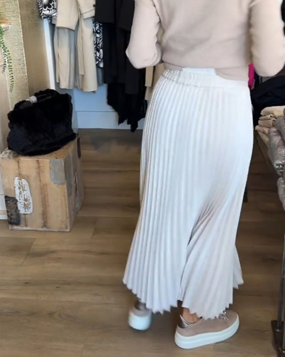 Plisserad enfärgad klänning