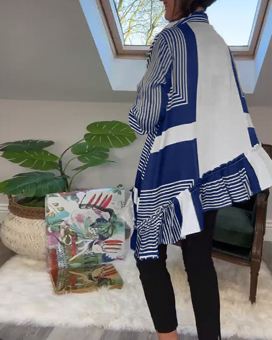 Modetryckt oregelbunden lapptröja med knappar