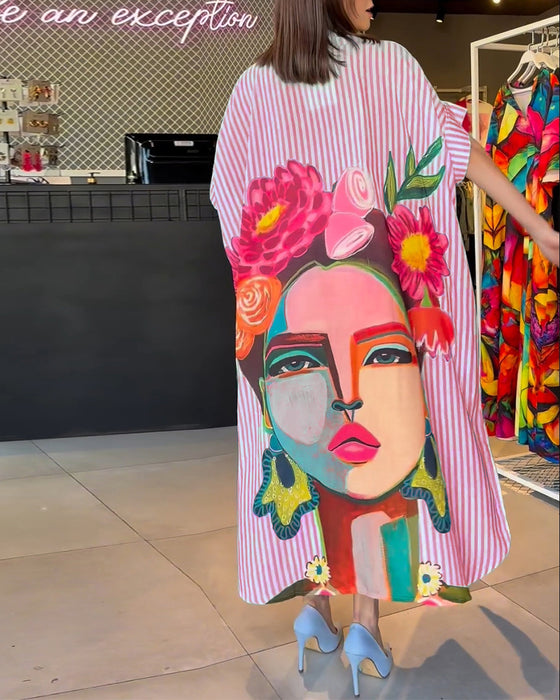 Vertikal randig blus med karaktärstryck i lapel