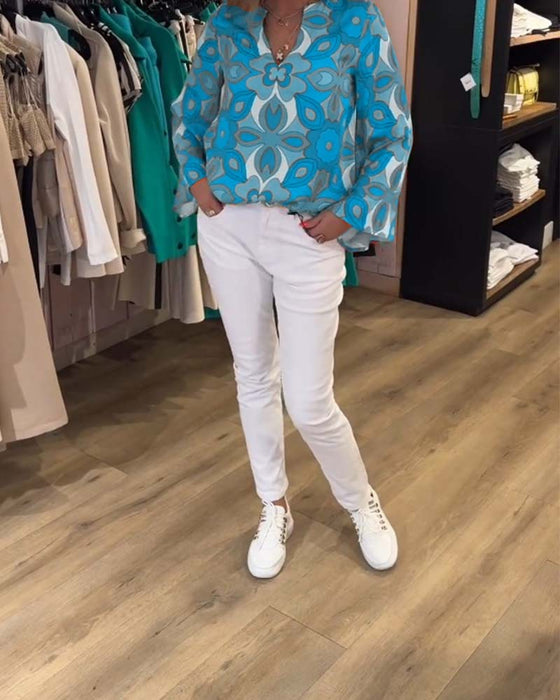 Blus med lösa, mångsidiga stilar och tryck