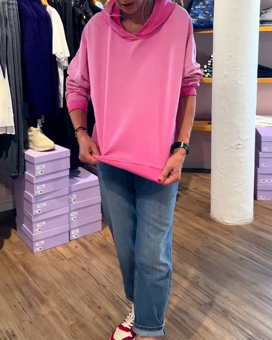 Avslappnad luvtröja med lutning