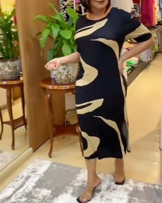 Lekis klänning med tryck och split