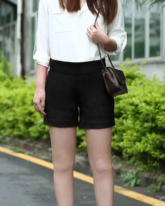 Enfärgade Shorts Mellanmidja