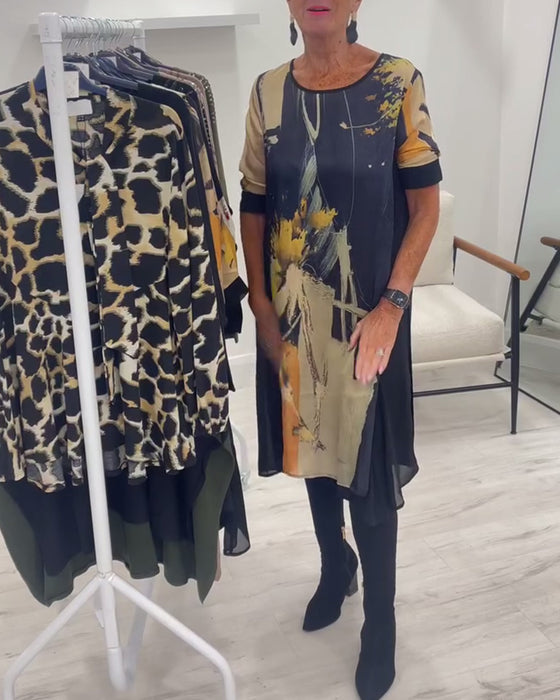 Klänning Med Rund Halsringning Och Retrotryck