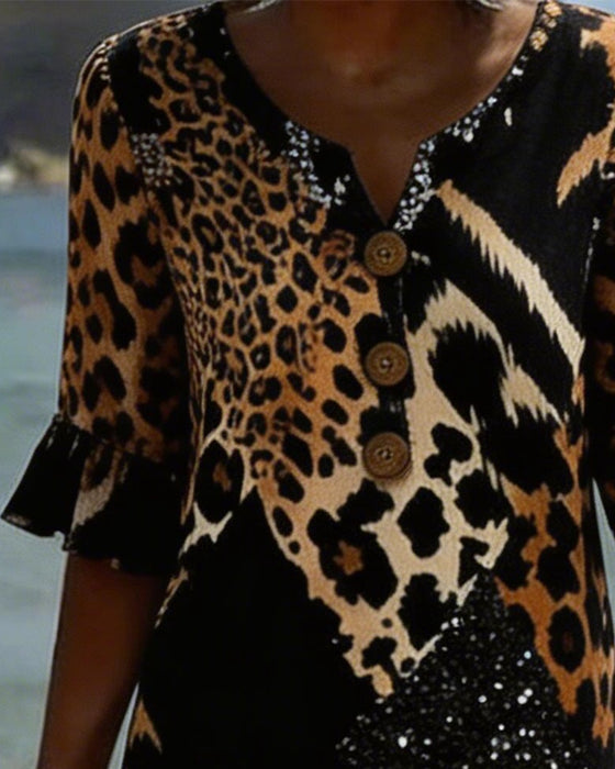 Klänning Med Leopardmönster Och V-Ringning