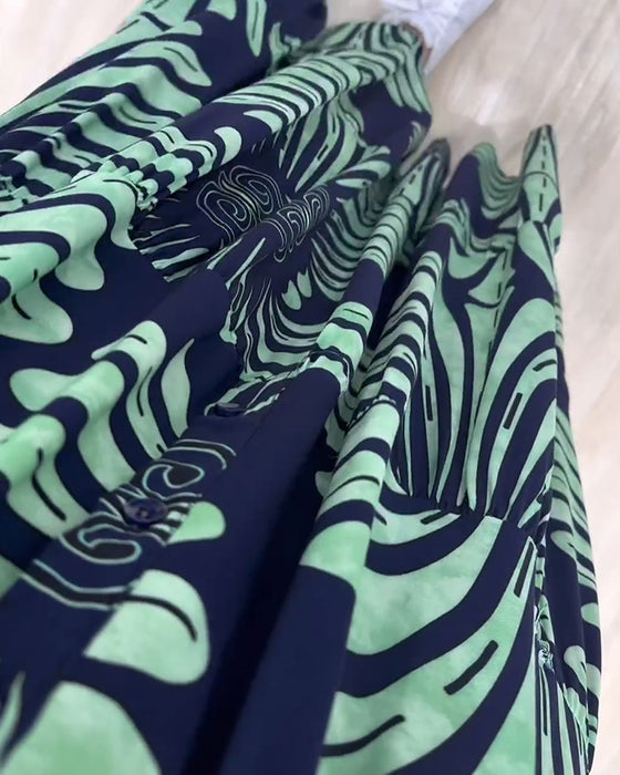 Ståkragetryckt lång klänning med lång ärm och patchwork