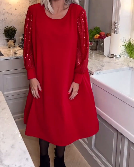 Trendig långärmad klänning i enfärgad paljettpatchwork