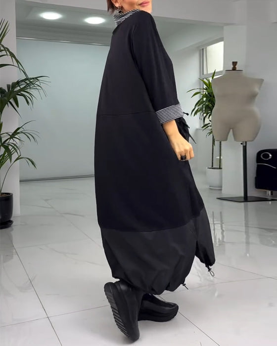 Avslappnad rutig lappklänning med hög krage