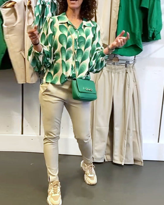 Blus med slag och tryck