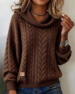 Enfärgad kabelstickad pullover