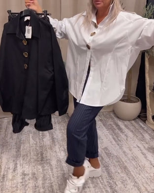 Snygg enfärgad skjorta med lapelknapp