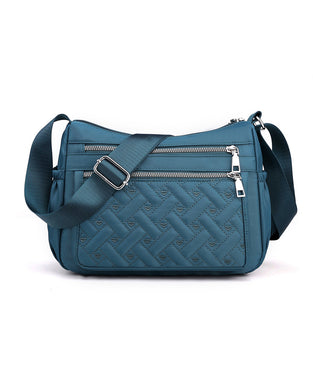 Avslappnad axelremsväska med stor kapacitet