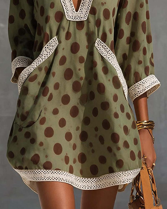 Klädning V-Hals Polka Dot Ficka