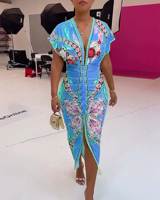 Klänning med djup V-slits i midjan