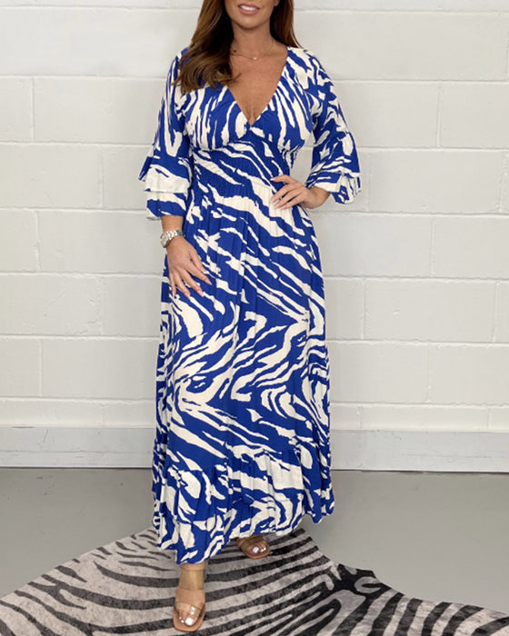 3/4-ärm klänning med v-ringning