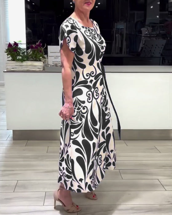 Elegant kortärmad klänning med kontrasttryck