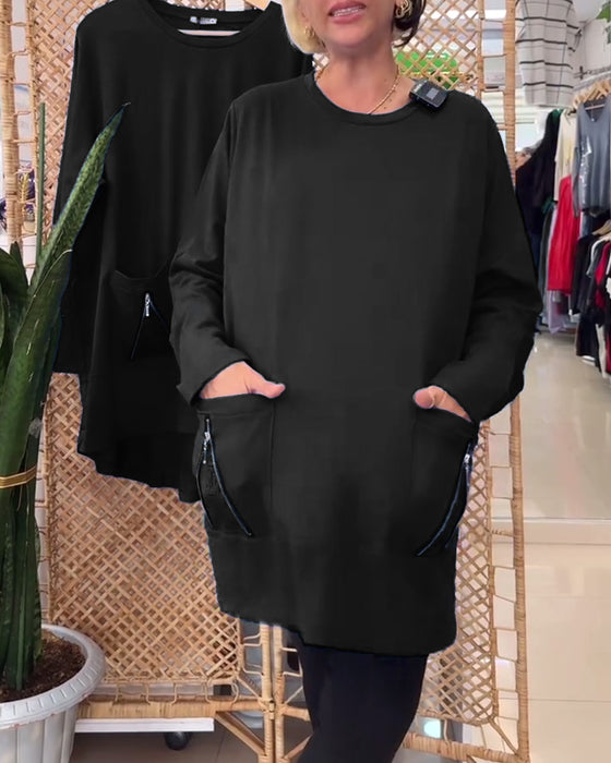 Enfärgad dragkedja i enfärgad tröja med rund hals