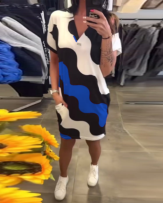 klänning V-ringad vågtryck