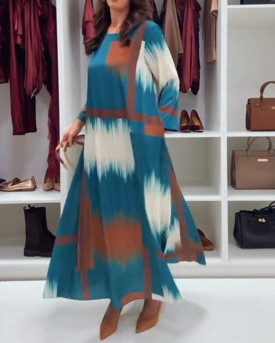 Modig Tryckt Klänning Med Runt Halsutsnitt Och Långa Ärmar