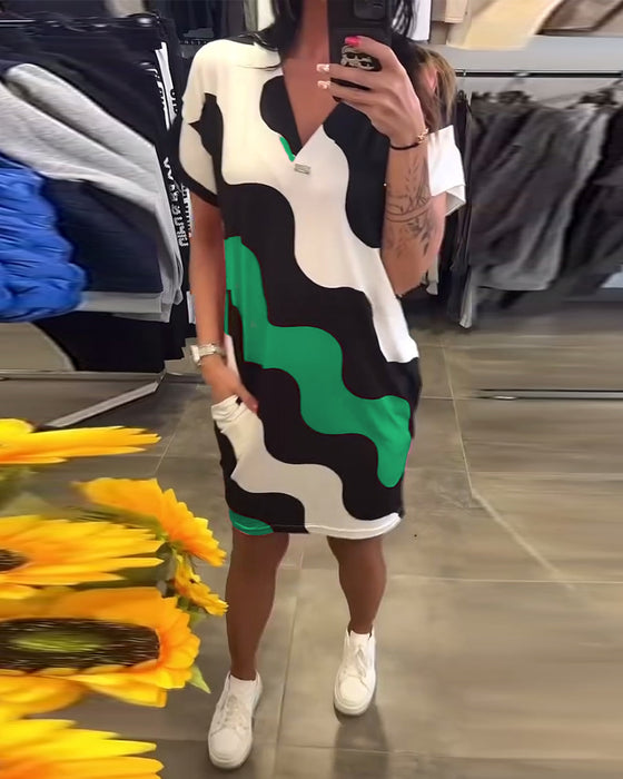 klänning V-ringad vågtryck