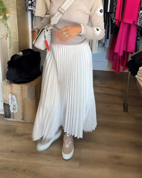 Plisserad enfärgad klänning