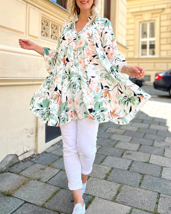V-ringad blommig elegant blus
