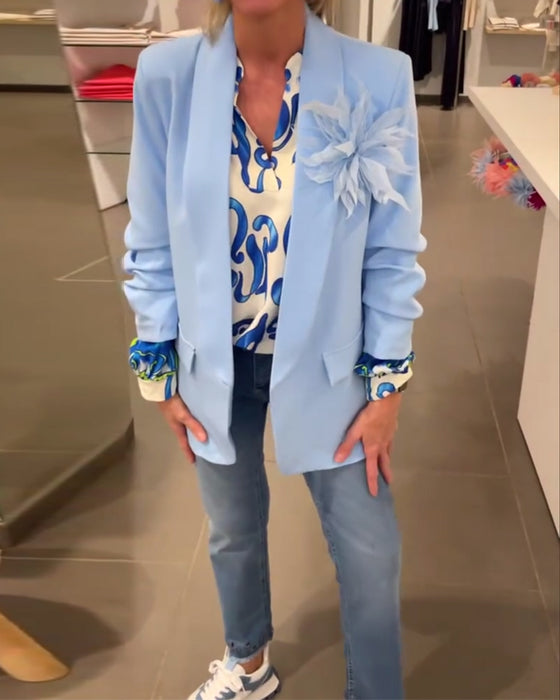 Elegant långärmad topp med tryckt V-ringning