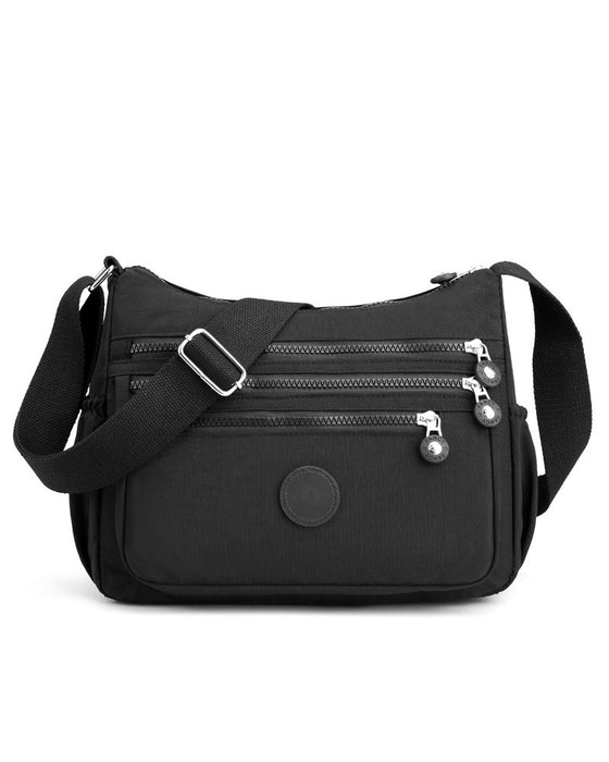 ⌛ Tidsbegränsat Erbjudande – Lätt Vattenavvisande Crossbody Väska 👜