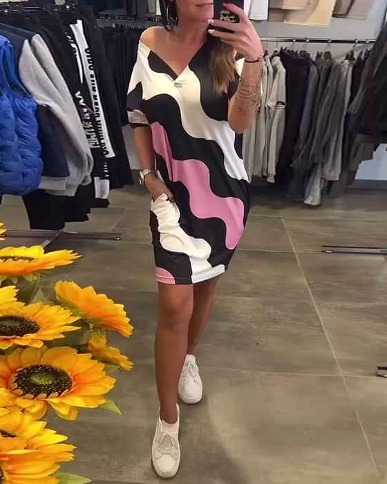 klänning V-ringad vågtryck