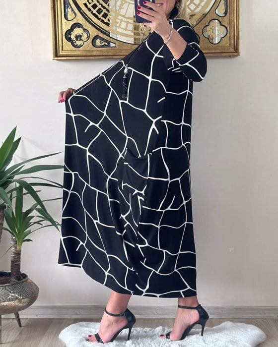 Klänning med rund hals långärmad ficka lös