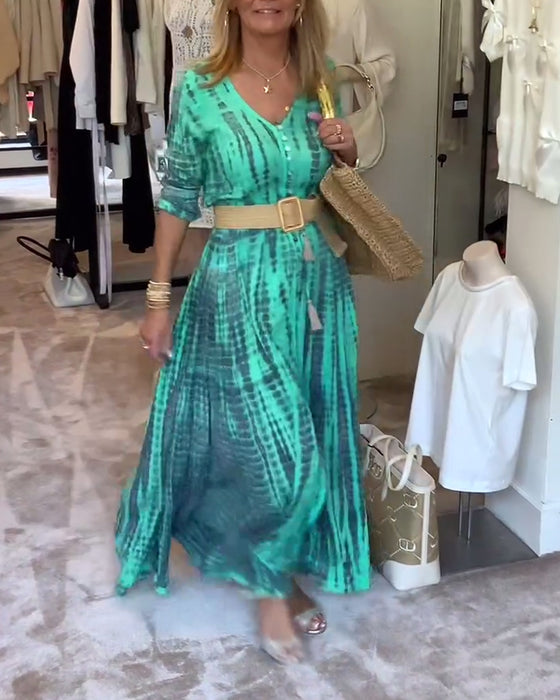 Tryckt V-ringad maxiklänning med knappar