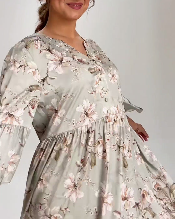 Klänning med blommig ärm