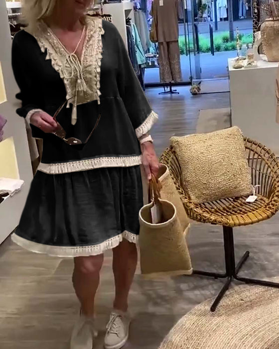 V-ringad frans i spets avslappnad klänning