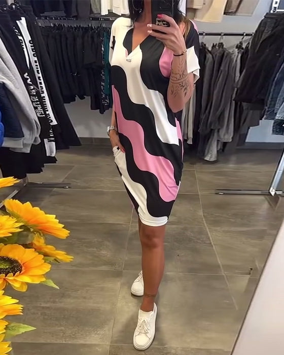 klänning V-ringad vågtryck