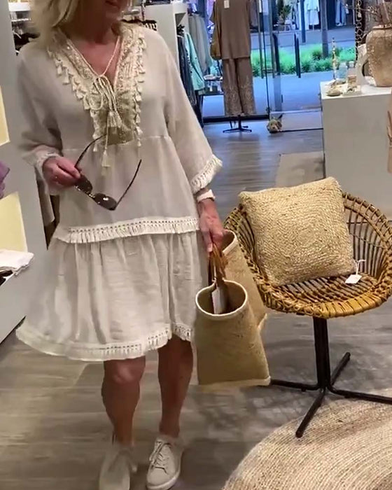 V-ringad frans i spets avslappnad klänning