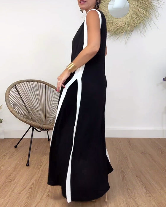 Trendig ärmlös klänning med V-ringad kontrasttryck