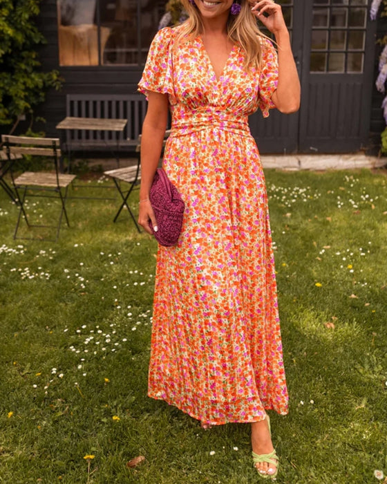 V-ringad blommig klänning i midjan